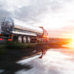 Gasoline tanker, Oil trailer, truck on highway. Very fast driving. 3d rendering.